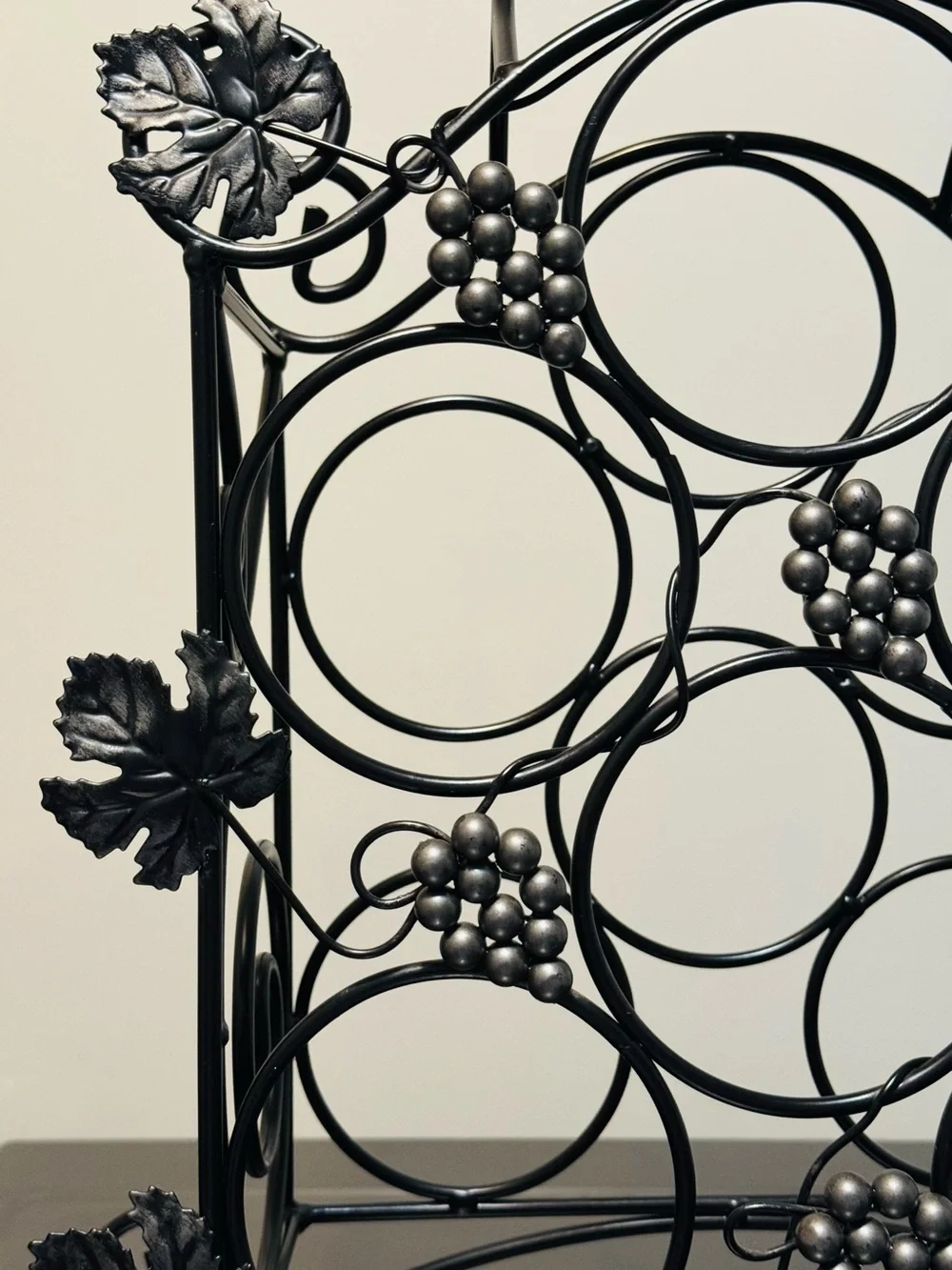 Black Metal Vintage Wine Rack with Silver Grape Accents